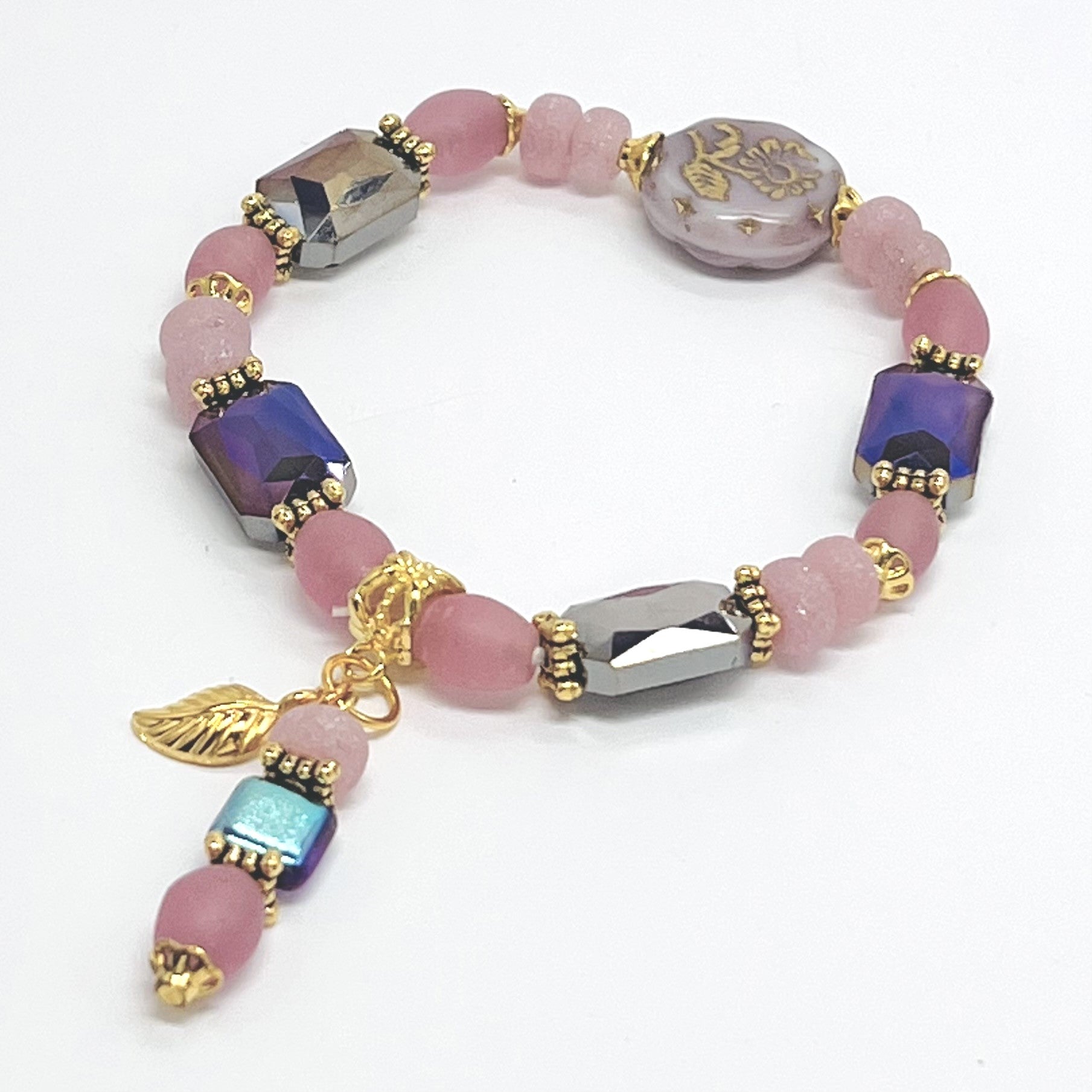 Romantic bracelet and earring set in pink and purple Czech glass with gold plated accents