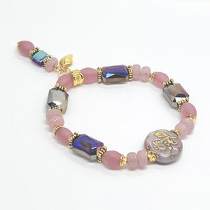 Romantic bracelet and earring set in pink and purple Czech glass with gold plated accents