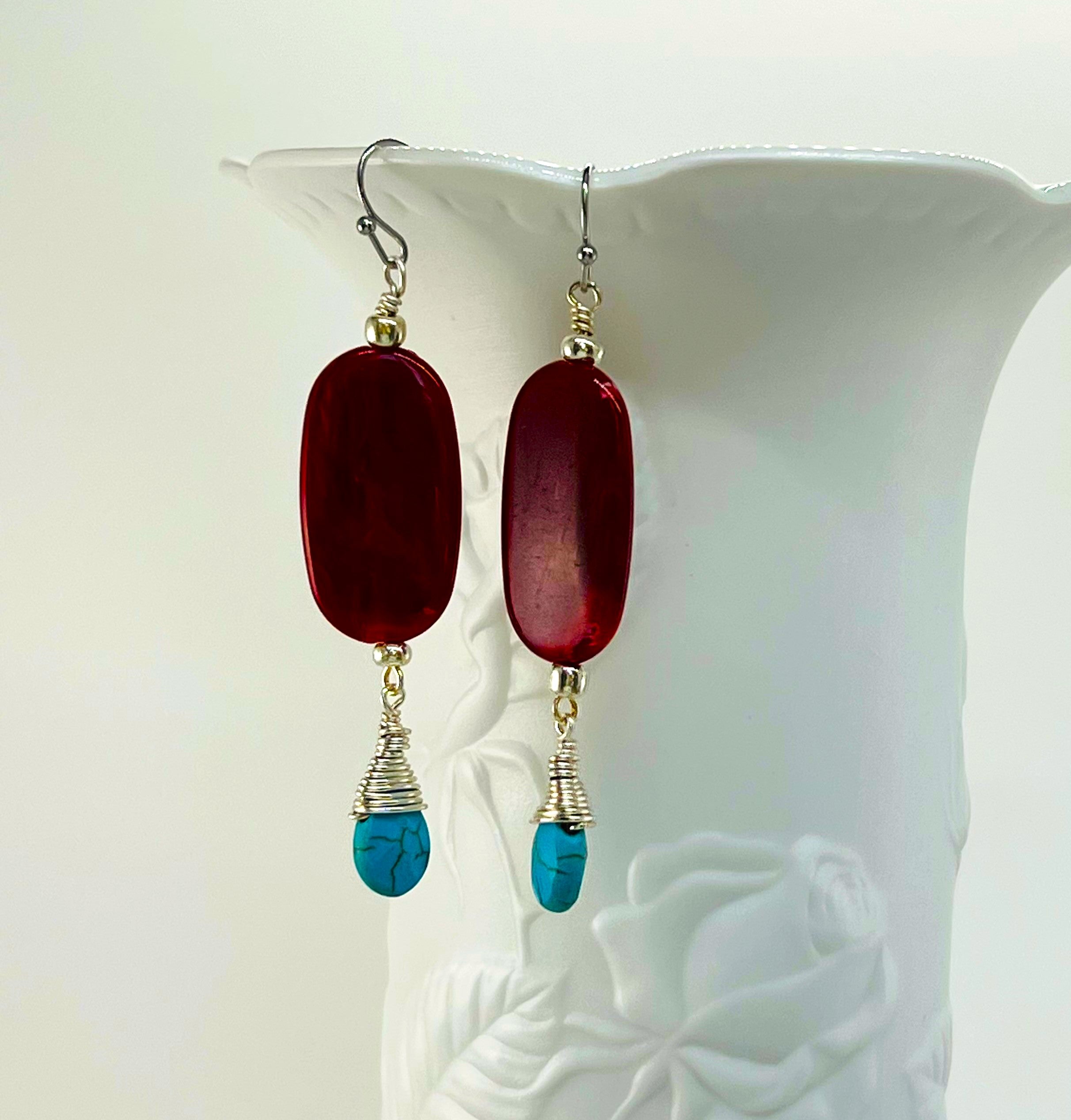 Statement necklace and earring set in turquoise howlite and deep red acrylic beads with silver accents