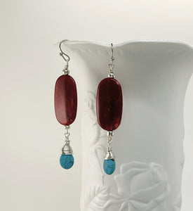 Statement necklace and earring set in turquoise howlite and deep red acrylic beads with silver accents