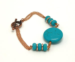 Bracelet and earring set, turquoise howlite and copper