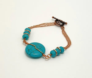 Bracelet and earring set, turquoise howlite and copper