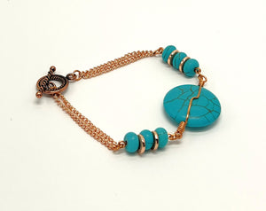 Bracelet and earring set, turquoise howlite and copper