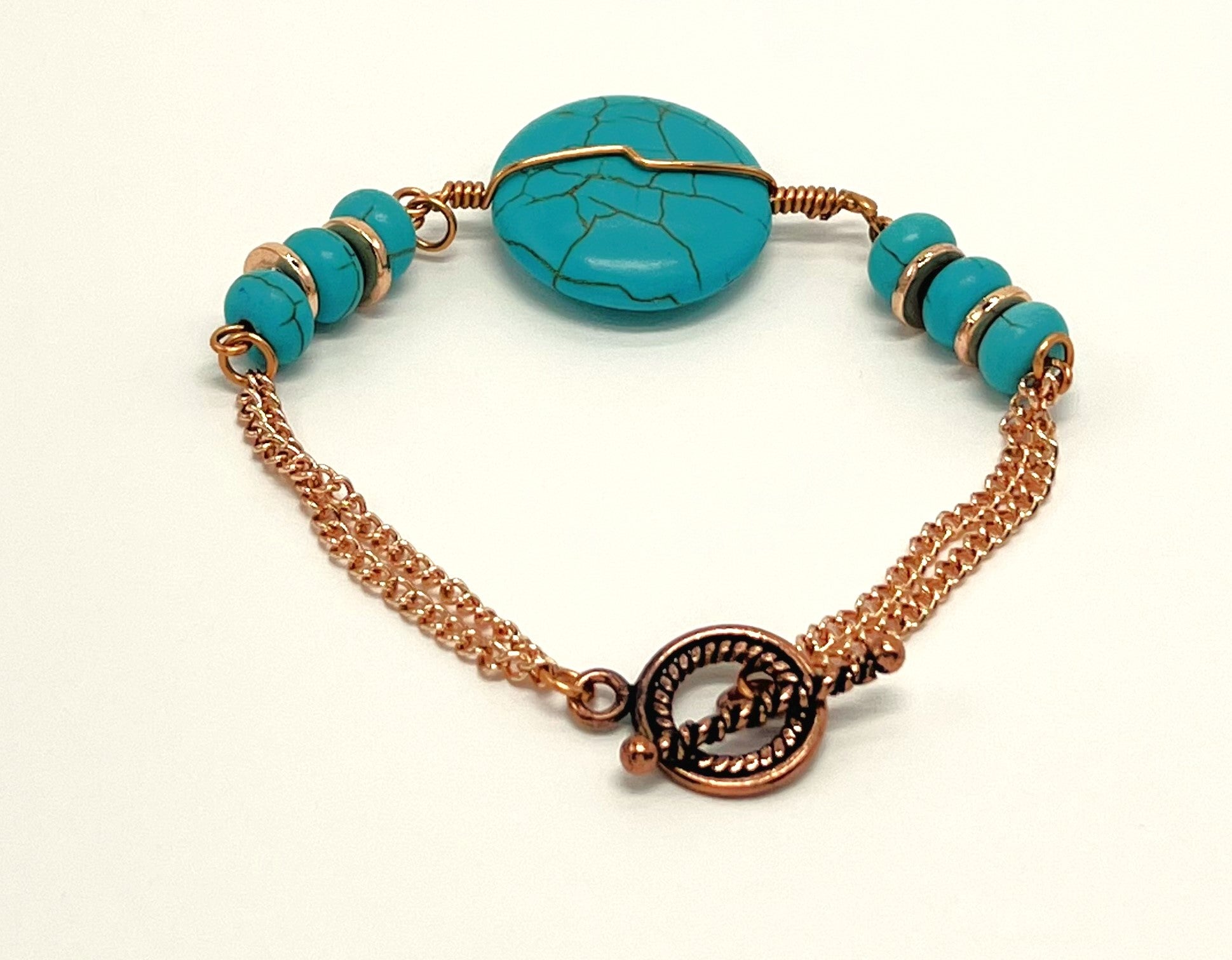 Bracelet and earring set, turquoise howlite and copper