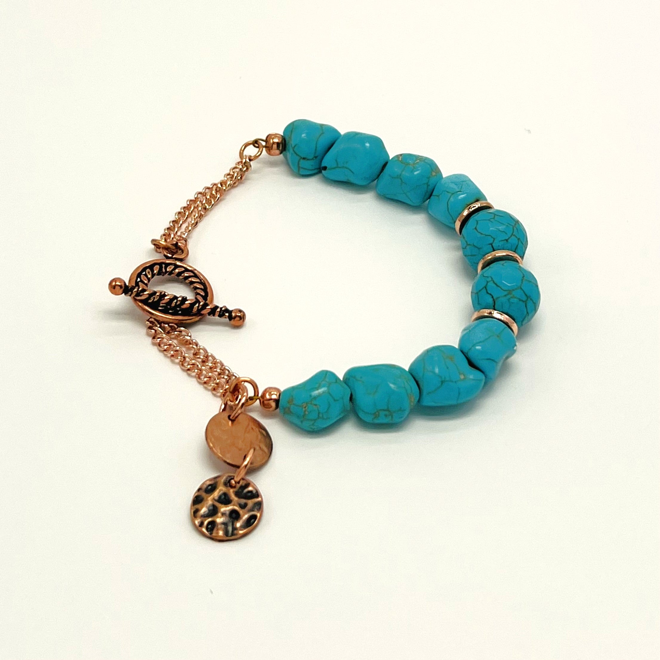 Bracelet and earring set in turquoise howlite round and chunk beads and copper