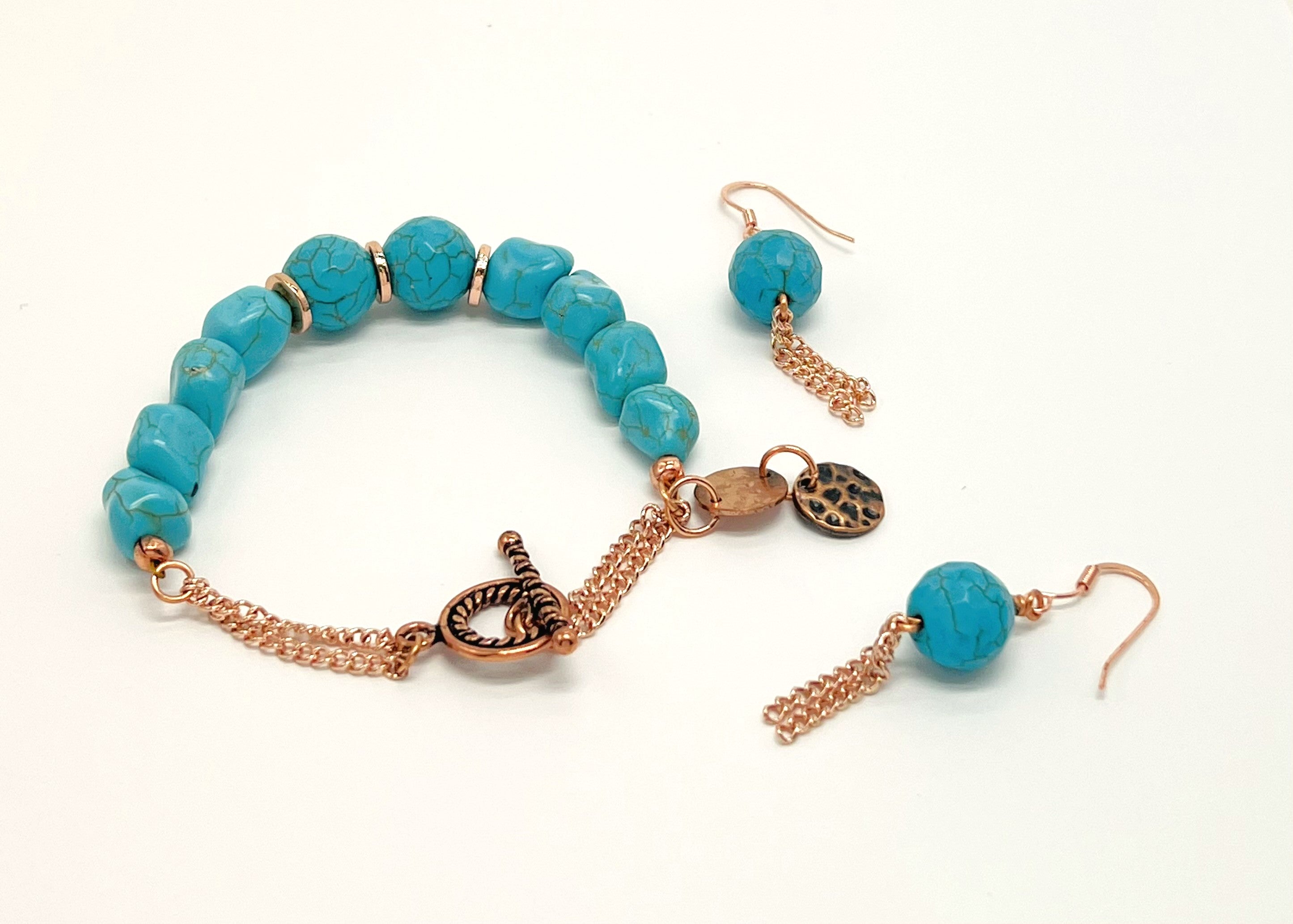 Bracelet and earring set in turquoise howlite round and chunk beads and copper