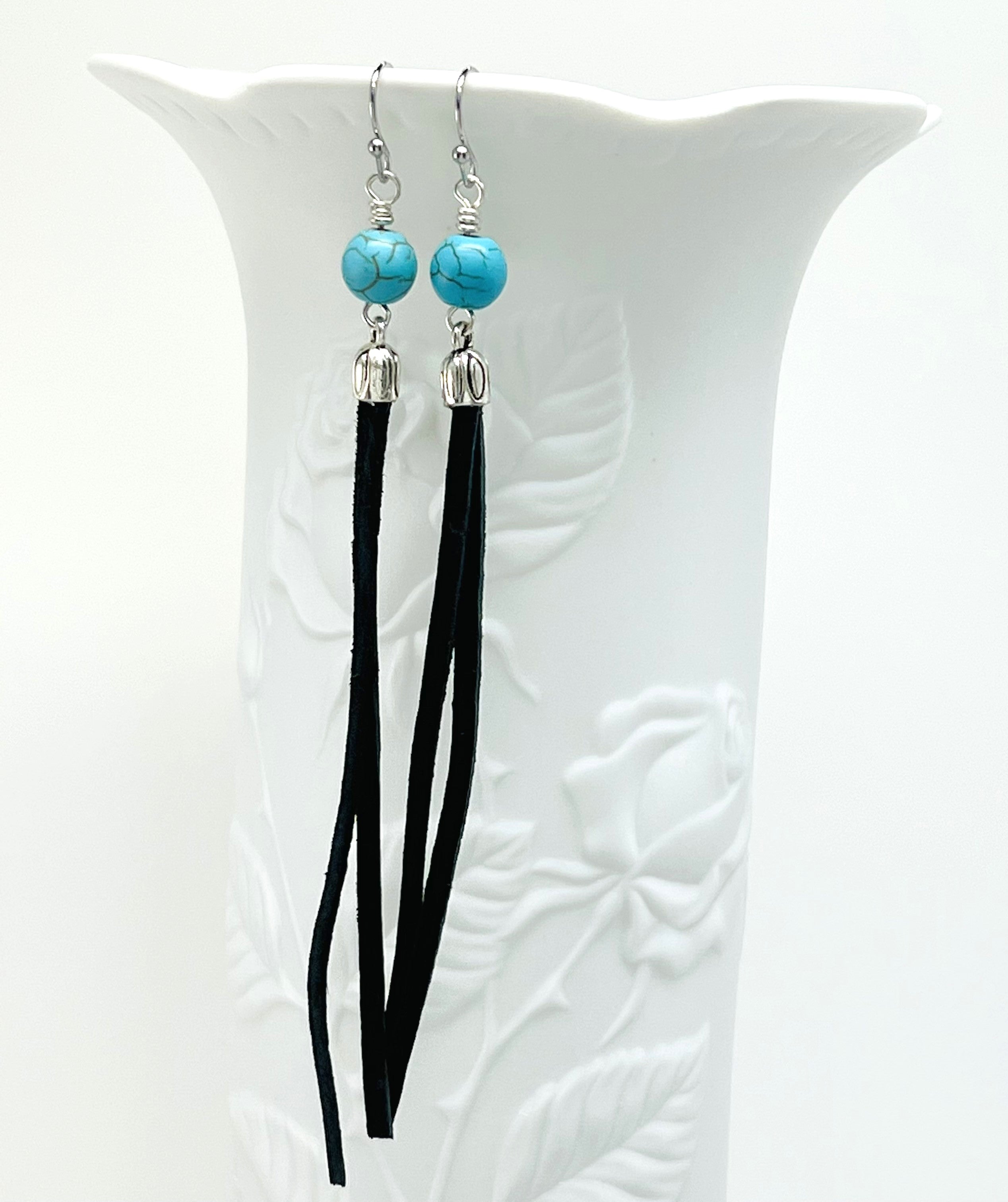 Leather earrings with turquoise Howlite stone beads with silver accents